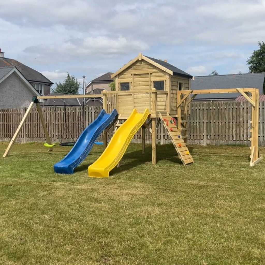 Spacious raised playhouse Two slides